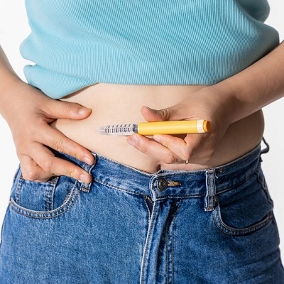 A,Woman,Injecting,Herself,With,Obesity,Medication