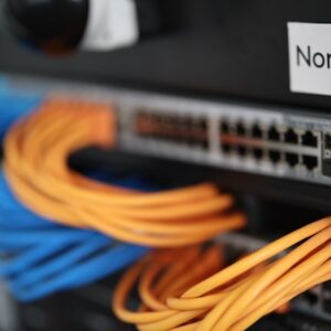 Network server cables connected to a switch in a data center